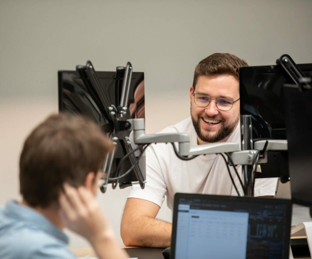 two people talking on a podcast